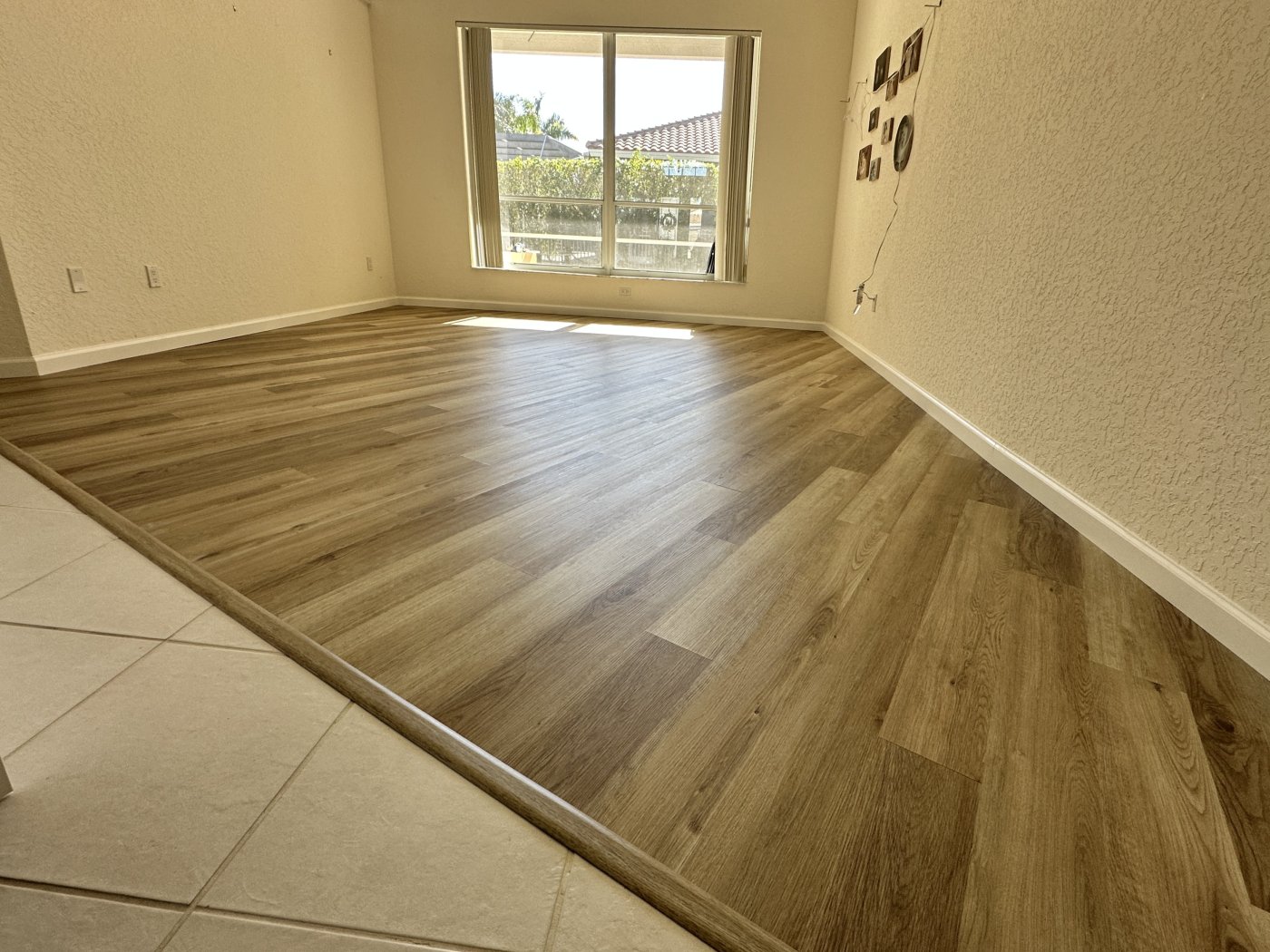After: Carpet to wood-look flooring